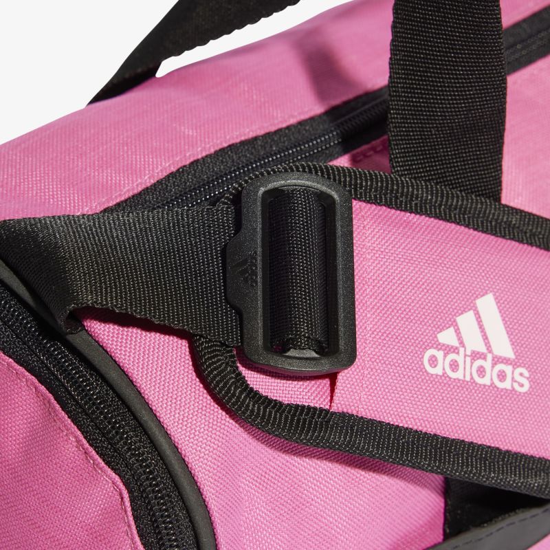 Robuste und stilvolle Sporttasche in Pink mit schwarzem Tragegurt und Reißverschluss für optimalen Komfort und Stauraum.