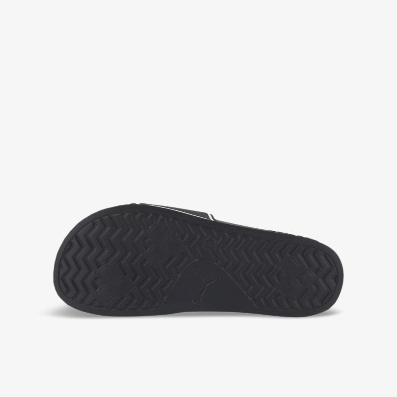 Hochwertige schwarze Sohle mit rutschfestem Profil für optimalen Halt und Komfort.