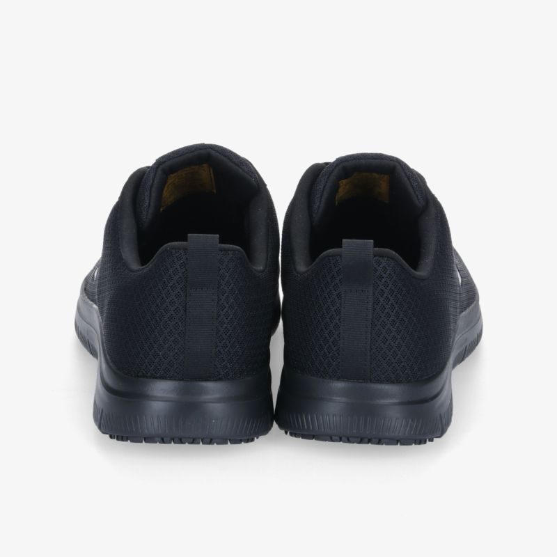 Schwarze Turnschuhe mit rutschfester Sohle und atmungsaktivem Obermaterial für maximalen Komfort.