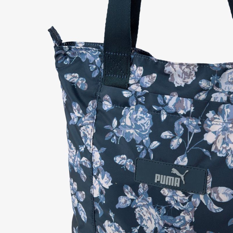 Stilvolle Tasche mit floralem Muster und Logo. Geräumig und strapazierfähig. Perfekt für jeden Anlass.