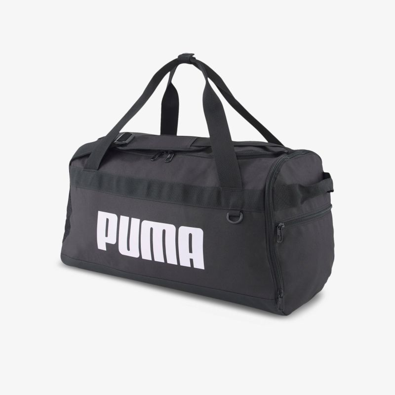Puma-Sporttasche in Schwarz mit großem Hauptfach. Ideal für Fitness und Reisen.