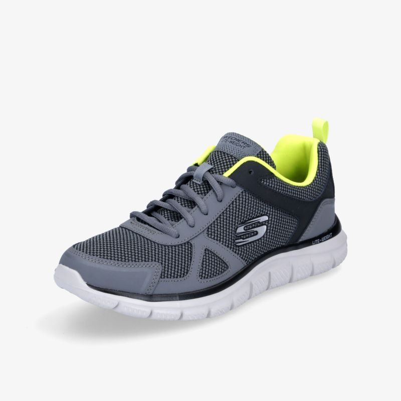 Moderner, grauer Sportschuh mit weißer Sohle und auffälligem gelben Innenbereich für optimalen Komfort und Stil.