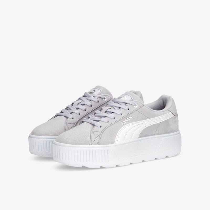 Modische graue Sneaker mit hoher weißer Sohle, sportlichem Design und Markenlogo in seitlicher Ansicht.