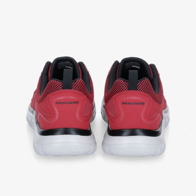 Rote Sportschuhe mit hoher Komfortsohle und modischem Design, perfekte Wahl für sportliche Aktivitäten.