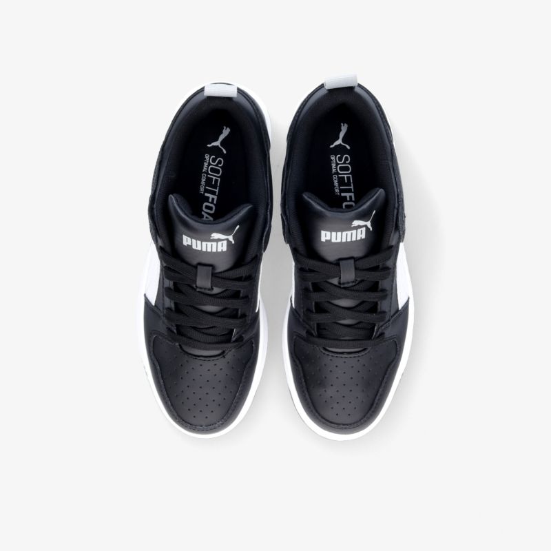 Moderne schwarze PUMA Sneaker mit weißem Akzent, perfekte Passform und stylisches Design.