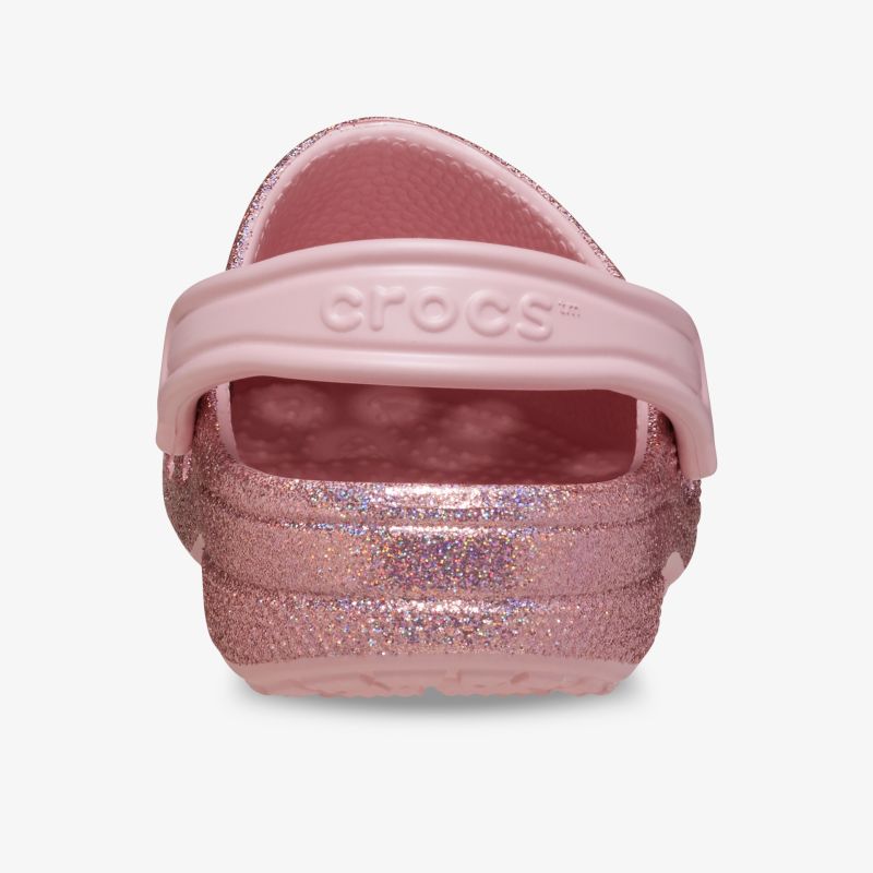 Rückansicht eines pink glitzernden Crocs Schuhs mit verstellbarem Fersenriemen, bequem und robust