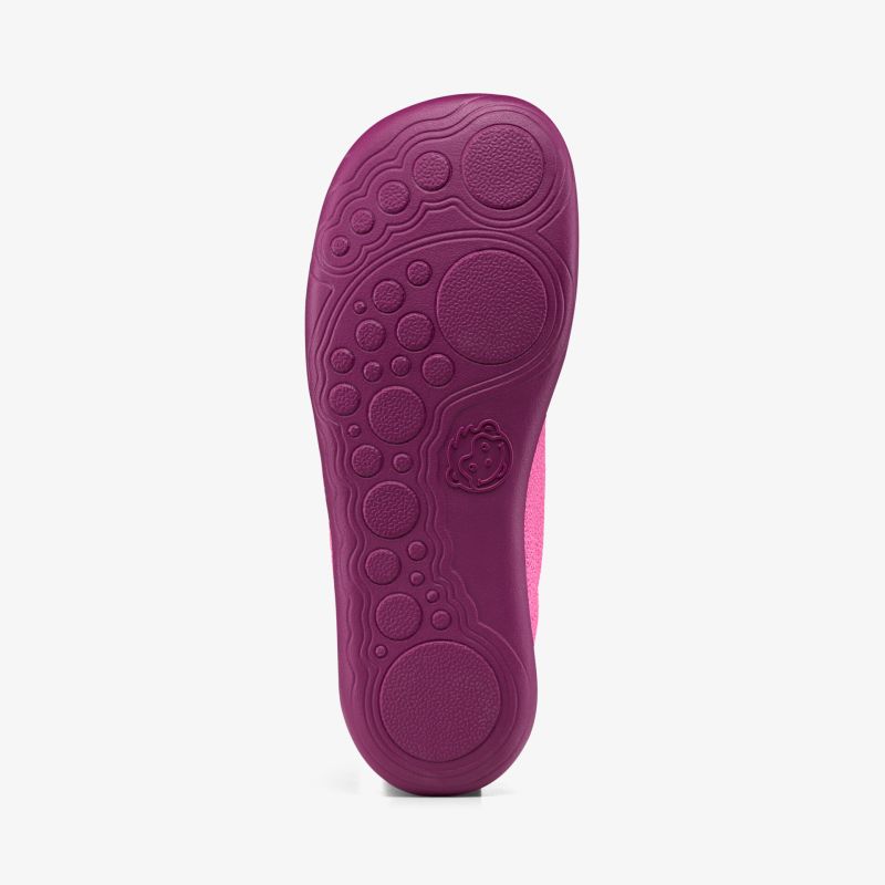 Ergonomische lila Schuhsohle mit rutschfestem Profil und stilvollen Akzenten.