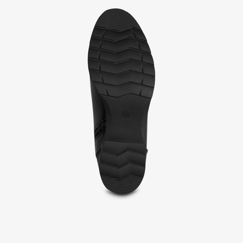 Robuste schwarze Schuhsohle mit tiefem Profil für sicheren Halt und Langlebigkeit