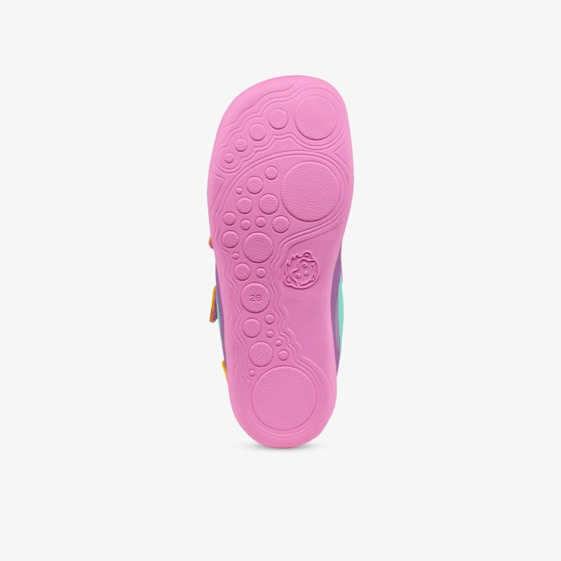 Nahaufnahme der robusten pinkfarbenen Schuhsohle mit flexiblem Profil und rutschfester Oberfläche