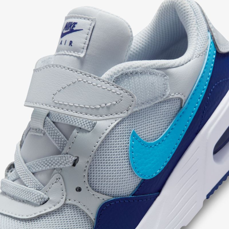 Blauer und grauer Sneaker mit Velcro-Verschluss und Air-Technologie, ideal für Komfort und Stil.