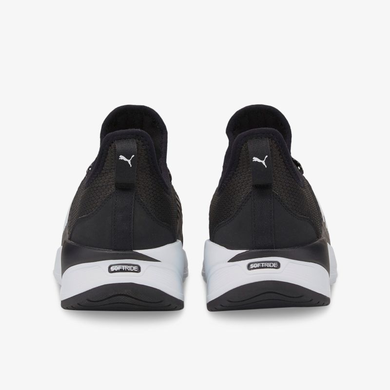 Stylische schwarze Sportschuhe mit weißer Sohle, Rückansicht, ideal für Freizeit und Training.