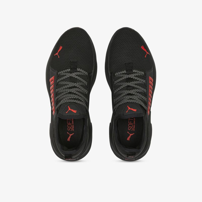 Stylische schwarze Sneaker mit rotem Akzent und komfortabler Passform für sportlichen Einsatz und Alltag.