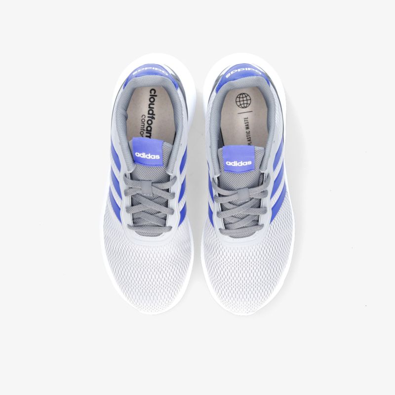 Graue Sportschuhe mit blauen Streifen, ideal für Laufen und Freizeit, bieten Komfort und stilvolles Design.