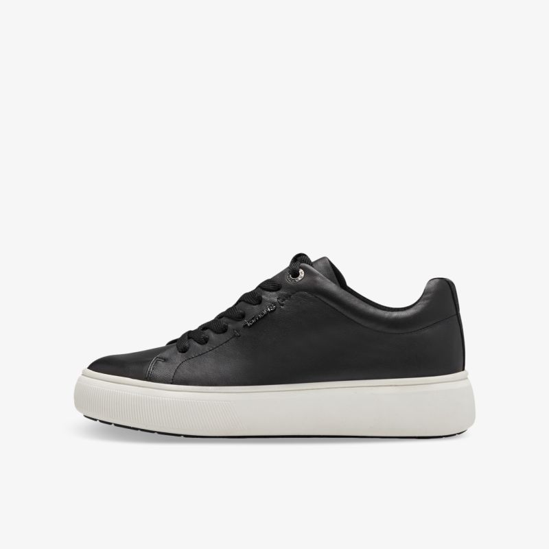 Schwarzer Sneaker seitlich mit weißer Sohle, sportlich, bequem und langlebig im modernen Design