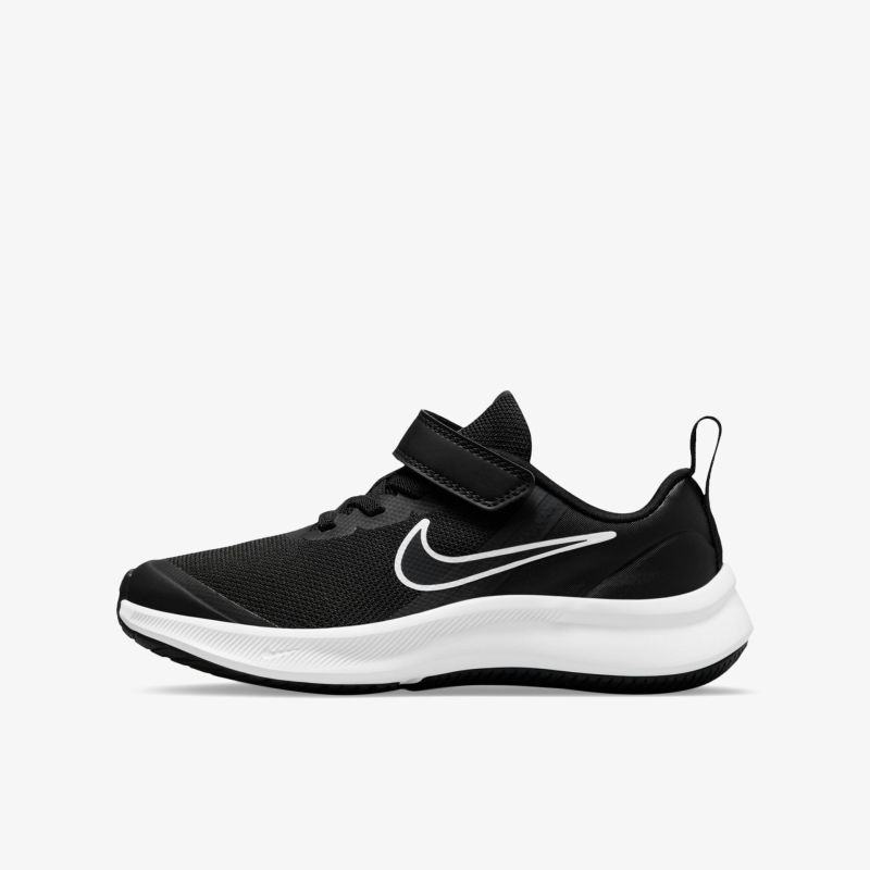 Schwarzer Sneaker mit weißer Sohle und Klettverschluss, ideal für Sport und Freizeit. Komfortabel und robust.