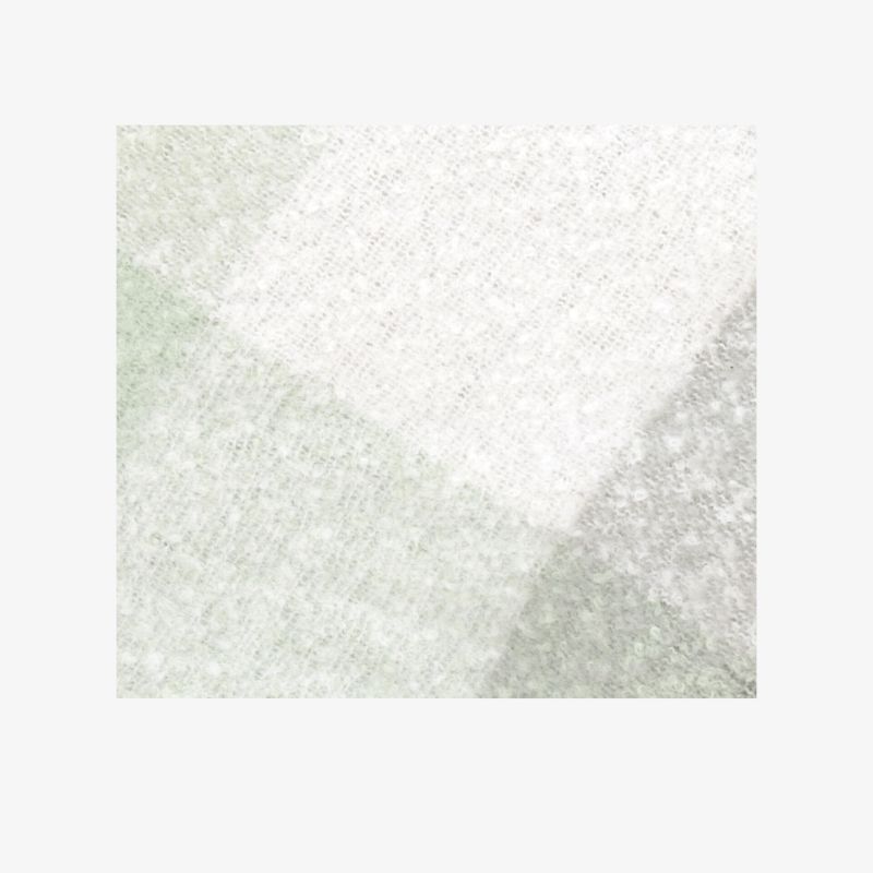Weicher Stoff mit angenehmer, warmer Textur und dezentem Farbverlauf in Pastelltönen