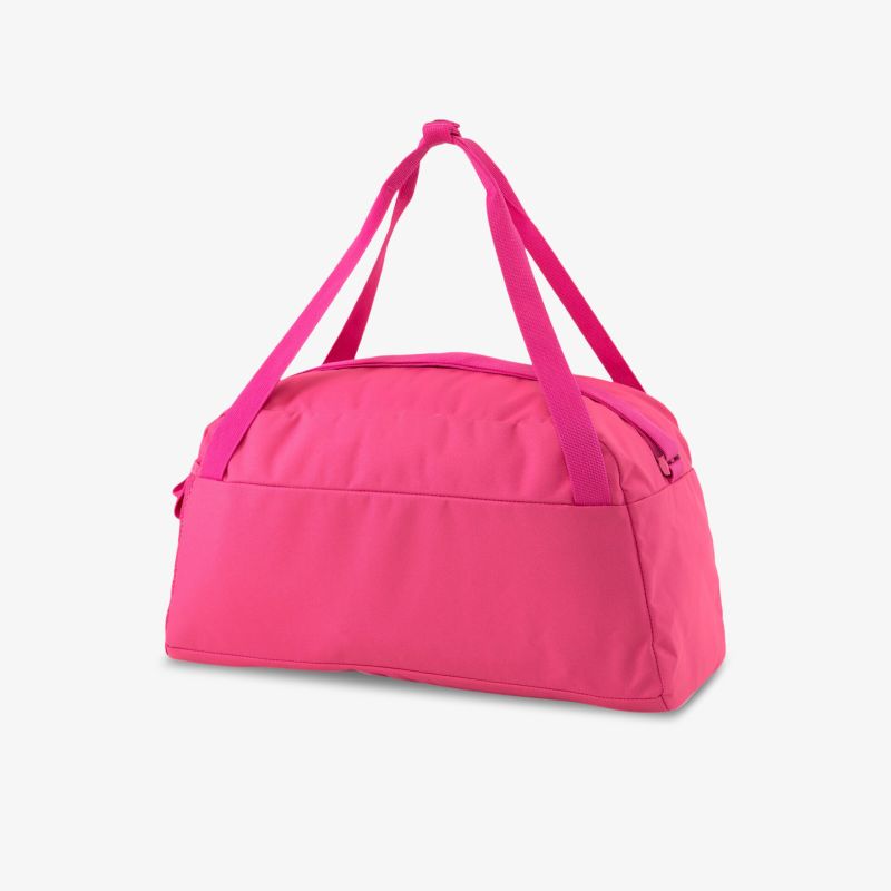 Robuste pinke Reisetasche mit geräumigem Hauptfach und stilvollen Trägern, ideal für Reisen und Fitnessstudio.