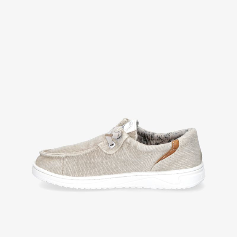 Beiger Slipper mit weichem Innenfutter und rutschfester Sohle für maximalen Komfort im Alltag.