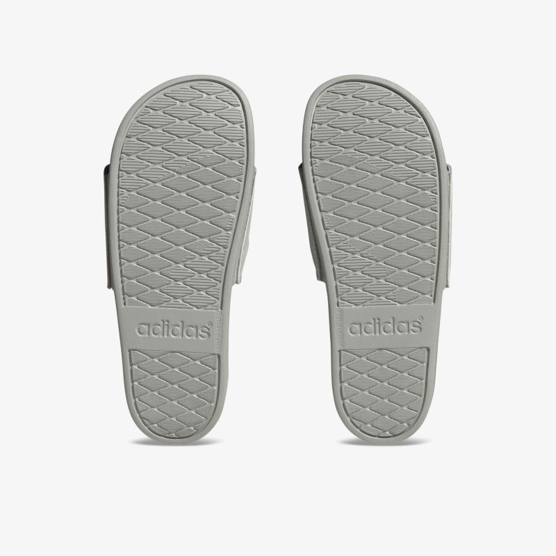 Vielseitige graue Badelatschen mit rutschfester Sohle und ergonomischem Design für maximalen Komfort.