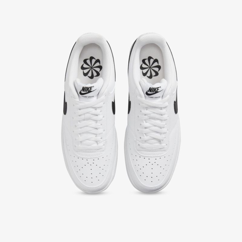 Weiße Leder-Sneaker mit schwarzem Akzent, klassisches Design, komfortabler Sitz und sportlicher Look.