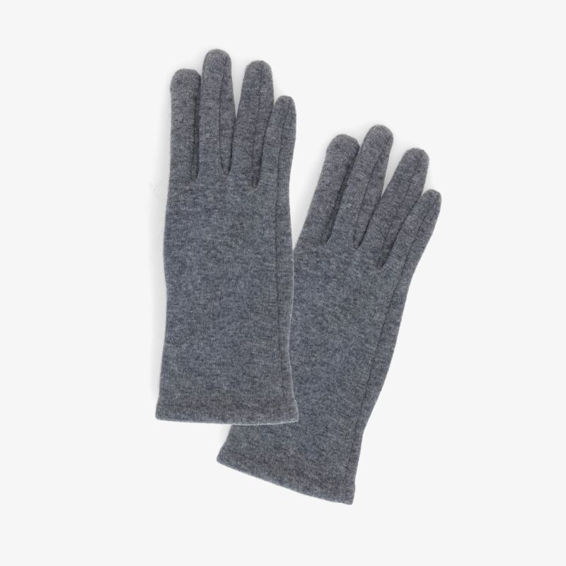 Graue Handschuhe aus weichem Material für stilvolle Wärme und hohen Tragekomfort.