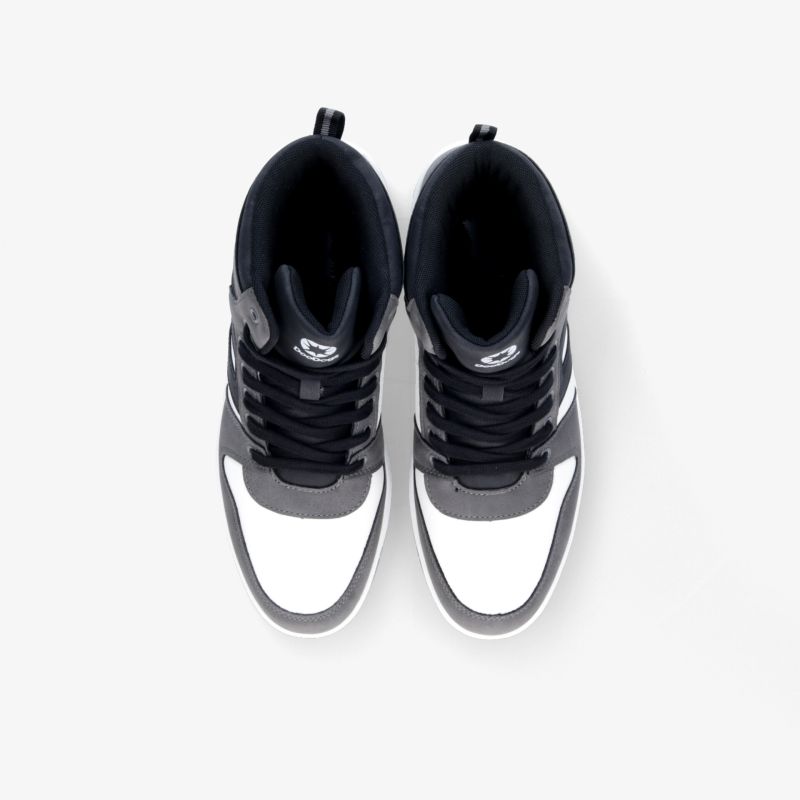 Moderne schwarze und weiße Sneakers, ideal für einen sportlichen und vielseitigen Look.