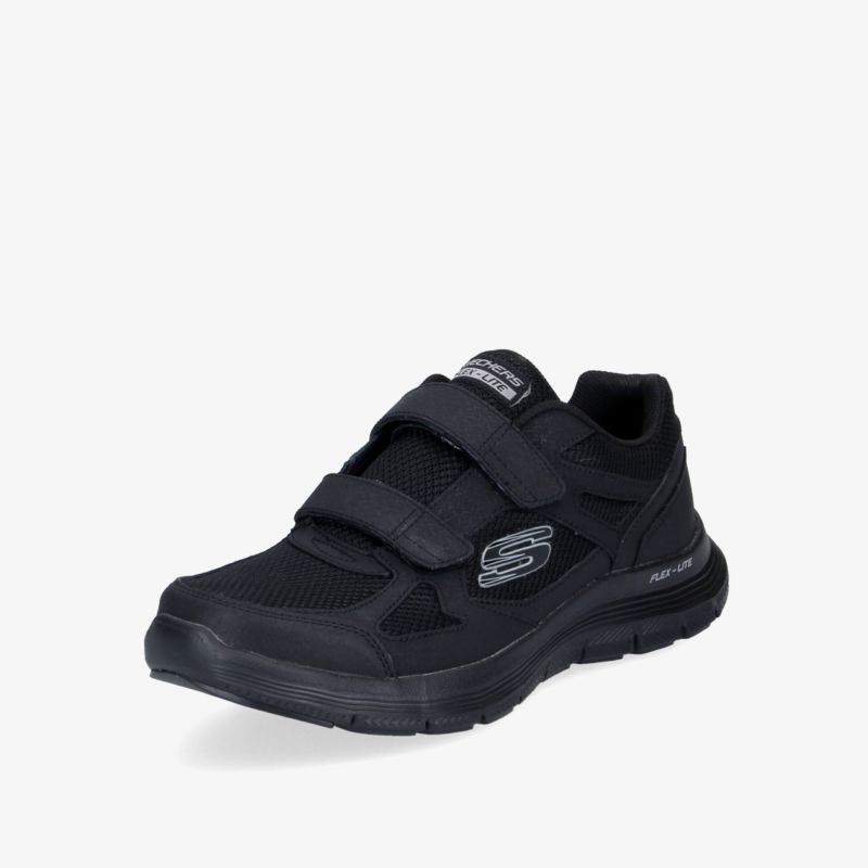 Bequemer schwarzer Schuh mit Klettverschluss und rutschfester Sohle, ideal für Alltag und Freizeit.