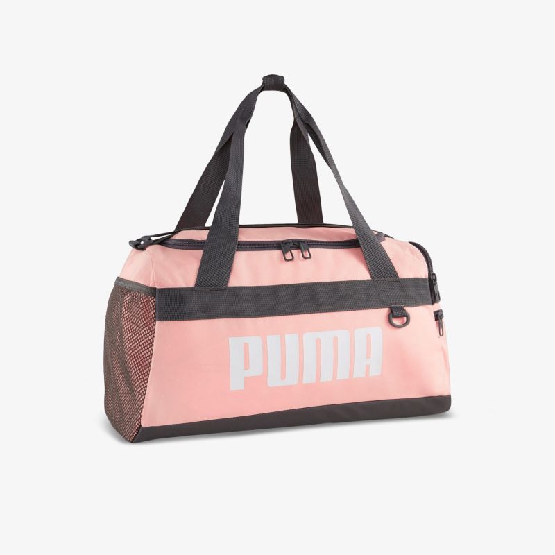 Rosa Puma Sporttasche mit schwarzen Griffen, ideal für Fitness oder Reisen, bietet viel Stauraum.