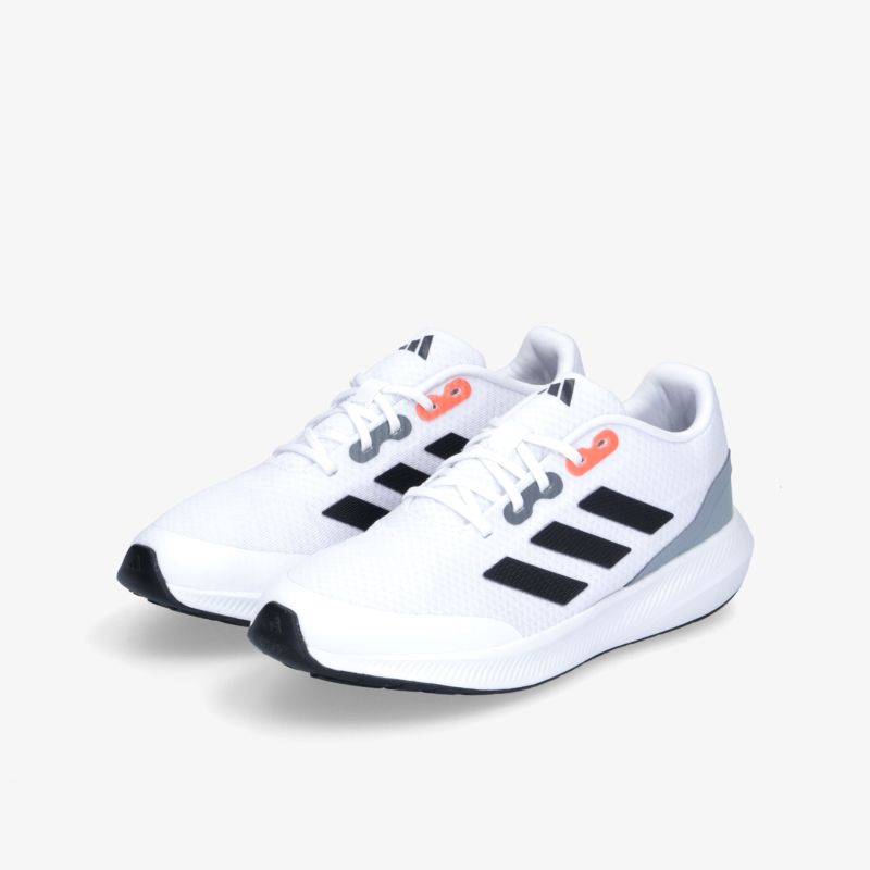 Moderner, sportlicher Sneaker in Weiß mit markanten Streifen und bequemem Design, ideal für vielseitige Aktivitäten.