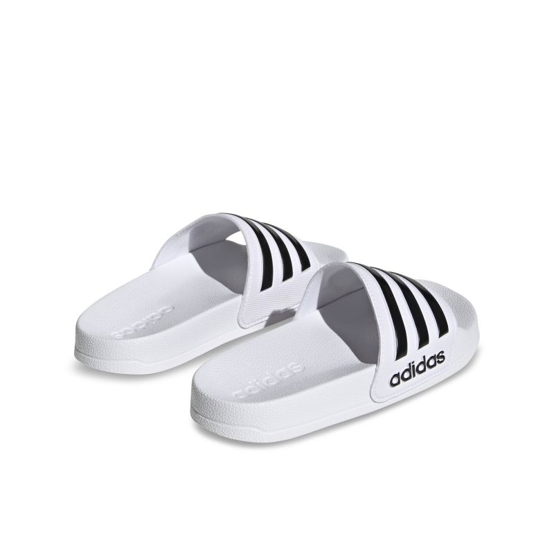 Komfortable weiße Adidas Badeschuhe mit schwarzen Streifen, ideal für Alltag und Freizeit, sportliches Design.