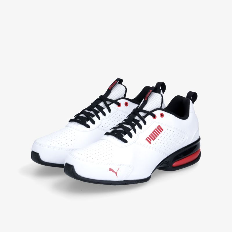 Weiße Sneaker mit schwarzer Sohle und roten Details, ideal für Sport und Freizeit.