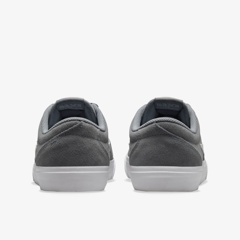 Graue Schuhe von hinten, modernes Design mit bequemer, gepolsterter Ferse und rutschfester weißer Sohle