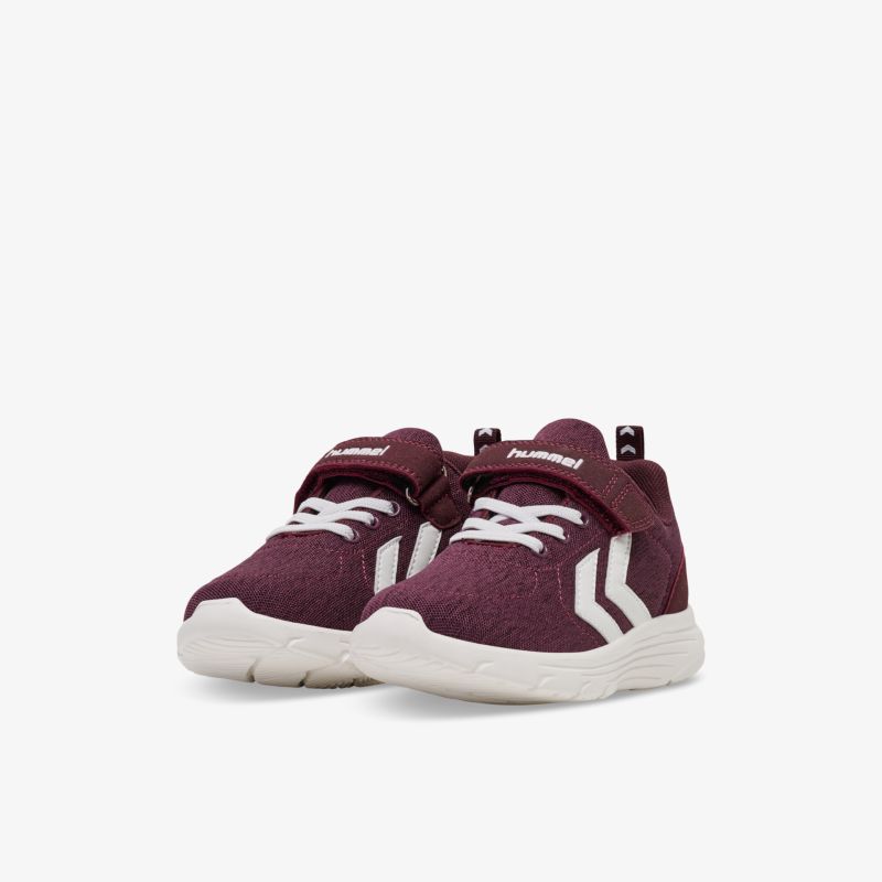 Kompakte Sportschuhe mit praktischen Klettverschlüssen und rutschfester Sohle in elegantem Design.