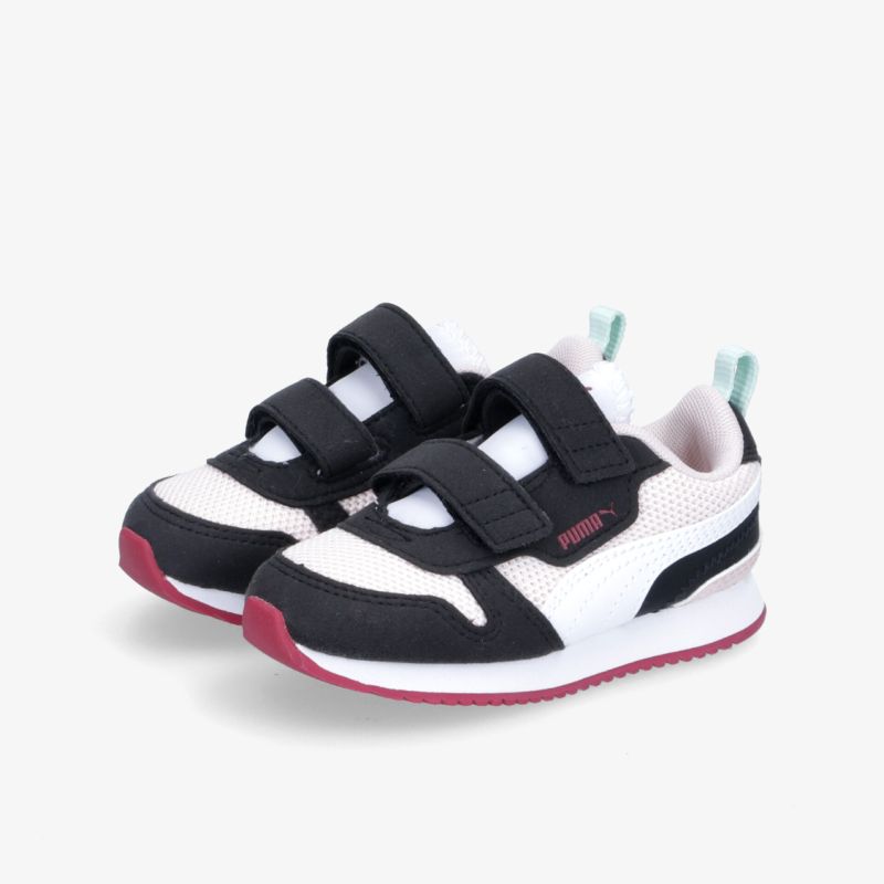 Stylishe Sneaker mit Klettverschlüssen und farbigen Akzenten für einen sportlichen und bequemen Alltag.