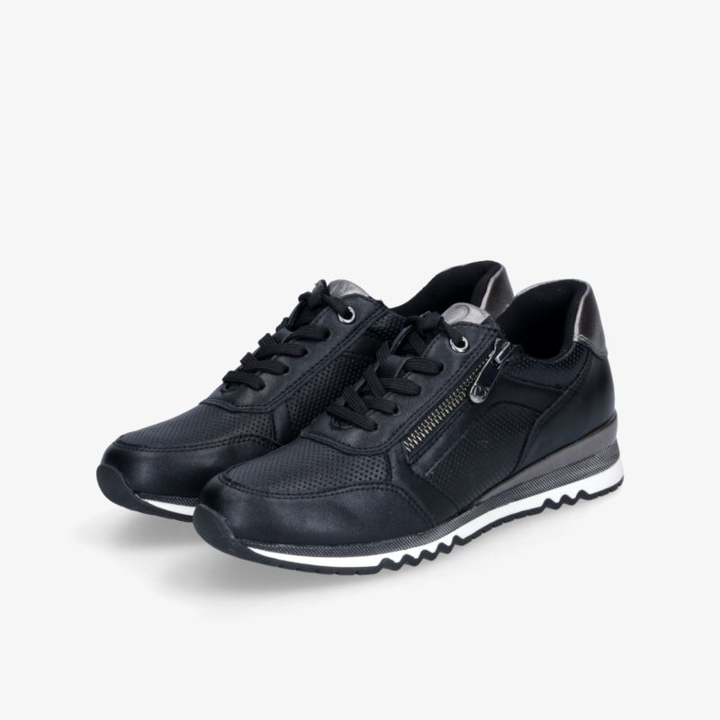 Sportliche schwarze Sneaker als Paar mit rutschfester Sohle und seitlichem Reißverschluss für Komfort und Stabilität