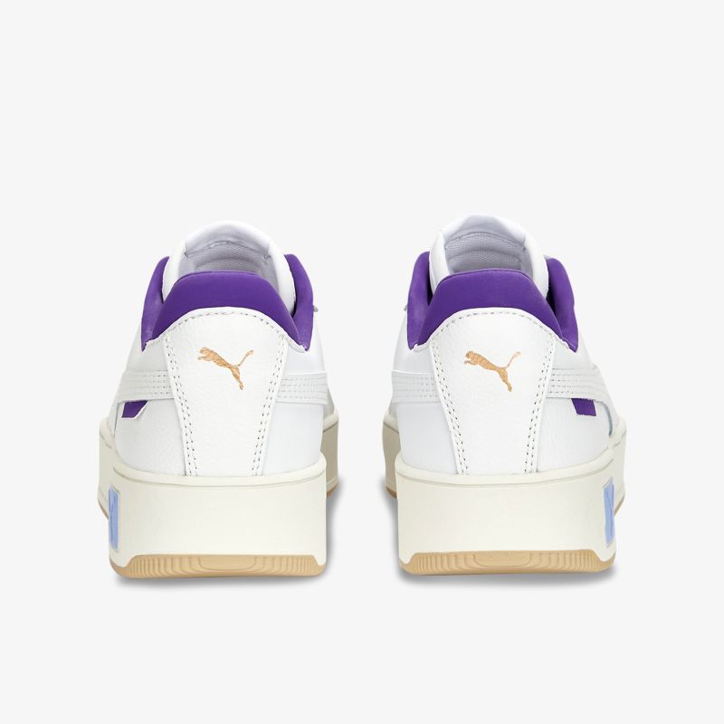 Stilvolle weiße und lila Sneakers mit rutschfester Sohle und auffälligem Markenlogo für sportlichen Tragekomfort.