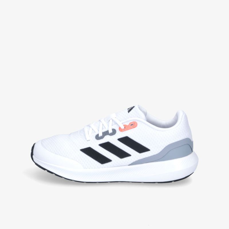 Moderner weißer Sneaker mit grauen und schwarzen Akzenten für sportlichen Stil und Komfort.