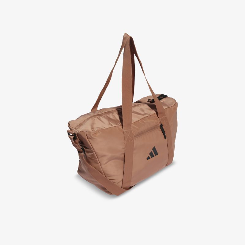 Geräumige braune Sporttasche mit robusten Trägern und praktischer Seitentasche für vielseitigen Einsatz