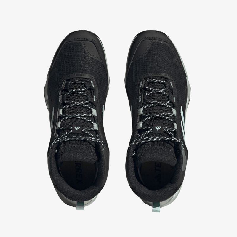 Robuste schwarze Schnürschuhe mit rutschfester Sohle und sportlichem Design für optimalen Komfort.