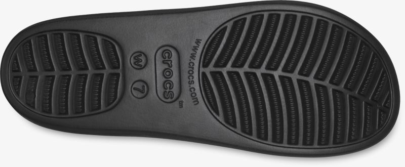 Strapazierfähige schwarze Sohle mit rutschfestem Profil für optimalen Halt und Komfort bei jedem Schritt.