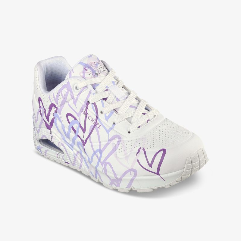 Weißer leichter Sneaker mit lila Herzmuster, gepolsterte Sohle und sportlichem Look, ideal für den Alltag