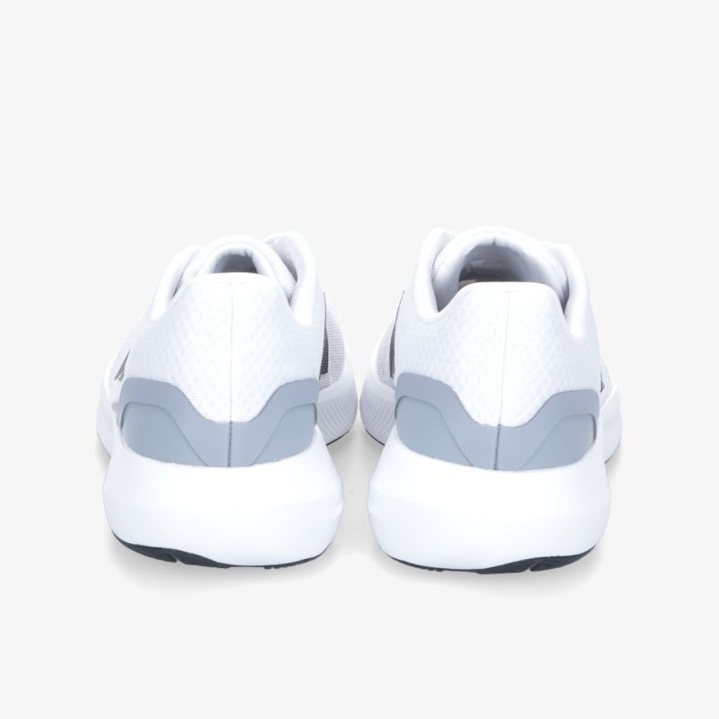 Stylische weiße Sneaker mit grauen Details und stabiler Sohle, die perfekten Tragekomfort bieten.