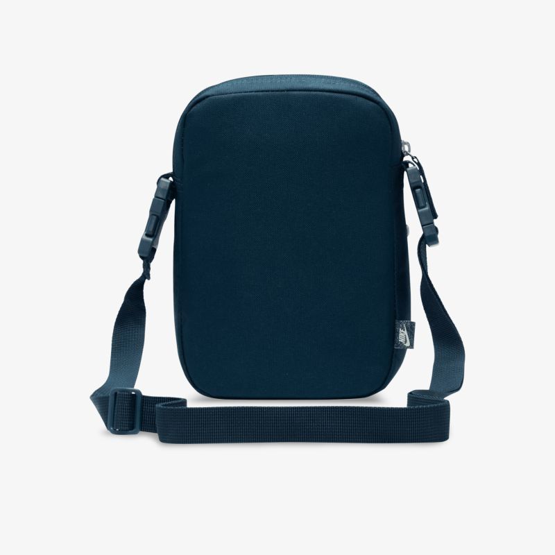 Kleine dunkelblaue Umhängetasche mit verstellbarem Schulterriemen und schlichtem, funktionalem Design