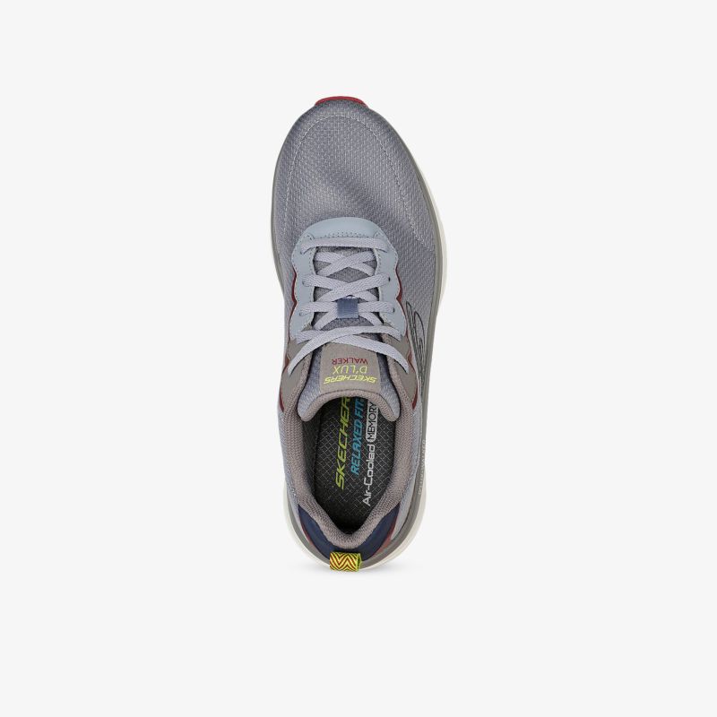 Moderner grauer Sneaker mit atmungsaktivem Material und stabiler Schnürung für optimalen Komfort.