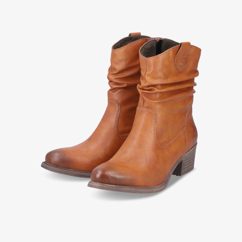 Braune Lederstiefel mit mittelhohem Absatz und weicher Materialstruktur, modisch und komfortabel