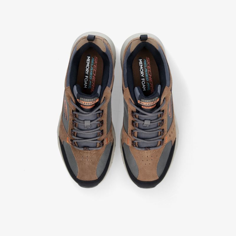 Bequeme Outdoor-Schuhe mit robuster Sohle und sportlichem Design, ideal für Abenteuer und Freizeit.