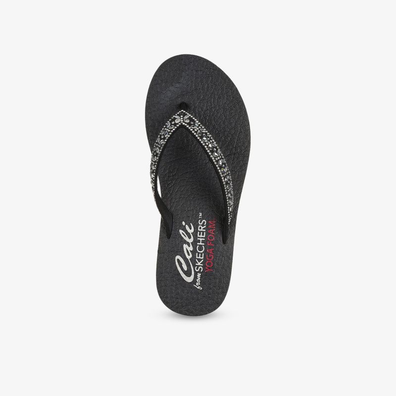 Schwarzer Flip Flop mit bequemer, rutschfester Sohle und sommerlichem Design, perfekte Passform für entspannten Komfort