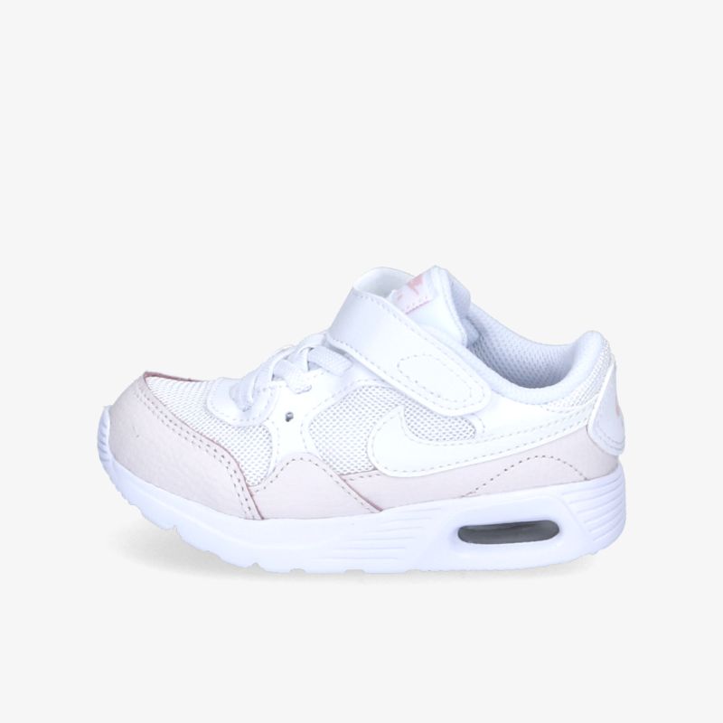 Sportlicher weißer Sneaker mit Klettverschluss und gepolsterter Sohle für optimalen Tragekomfort.