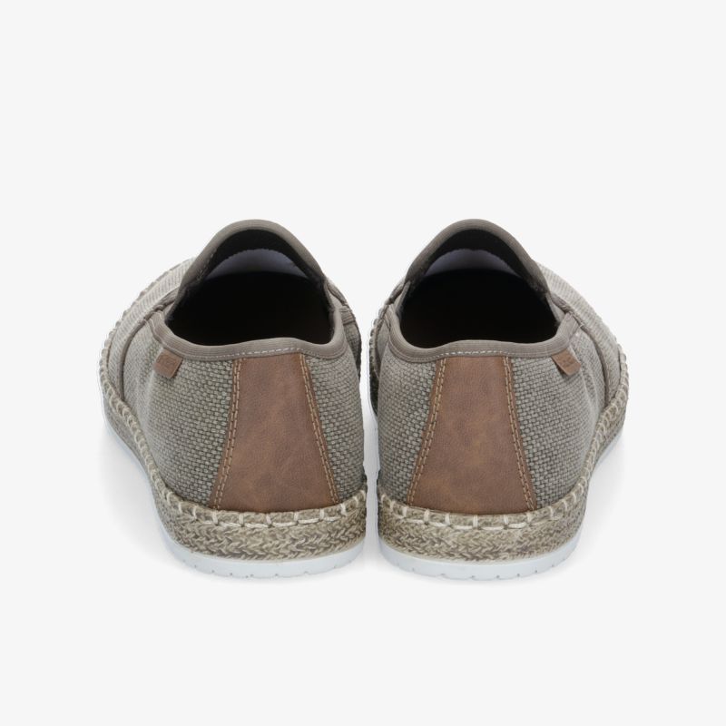 Bequeme beige Schuhe mit strukturierter Oberfläche und Gummisohle, ideal für lässigen Stil.