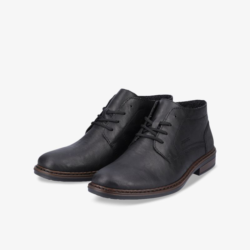 Elegante schwarze Lederstiefel mit Schnürung und robuster Sohle für vielseitige Outfits und Anlässe.